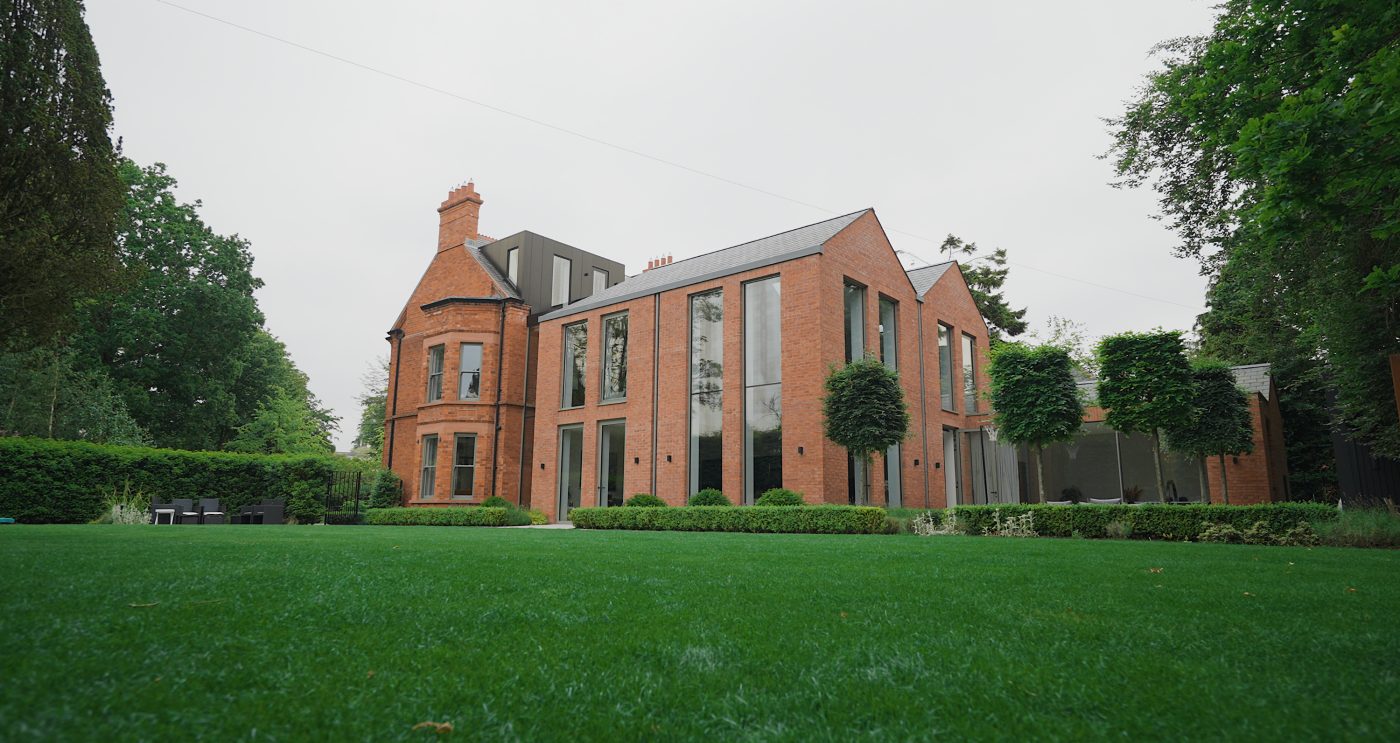 Wide shot of new extension on big Victorian home