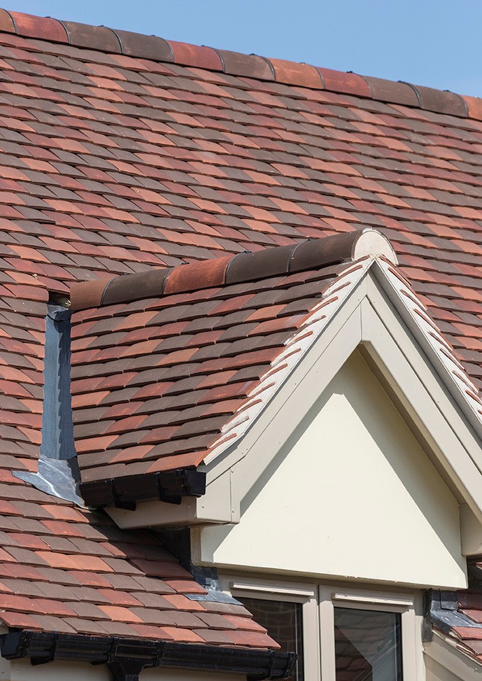 What are the different types of roof tile surface finishes