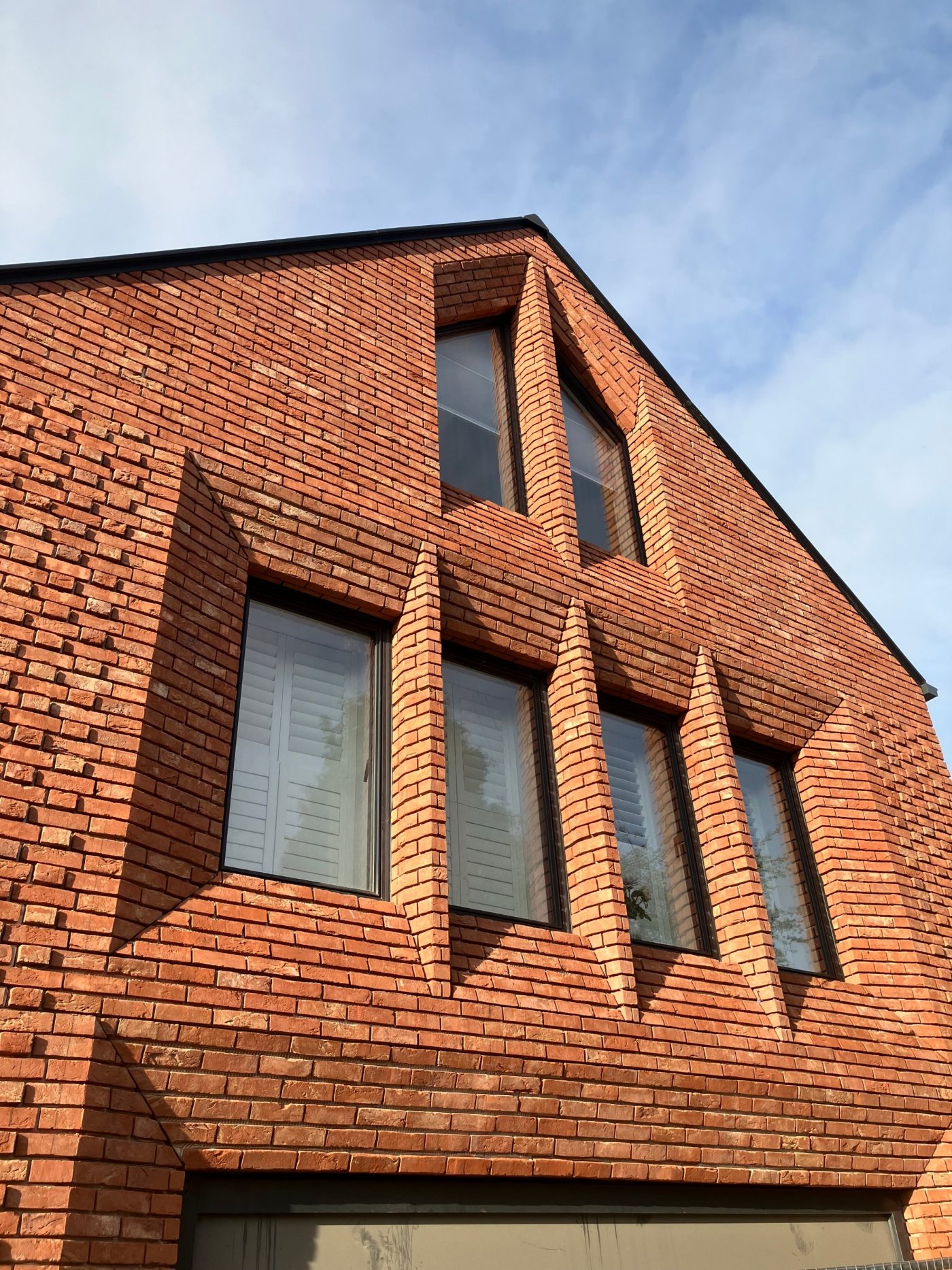 Modern large house with brick facade