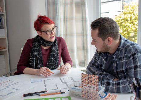 Architect Lisa Raynes consulting with a homeowner