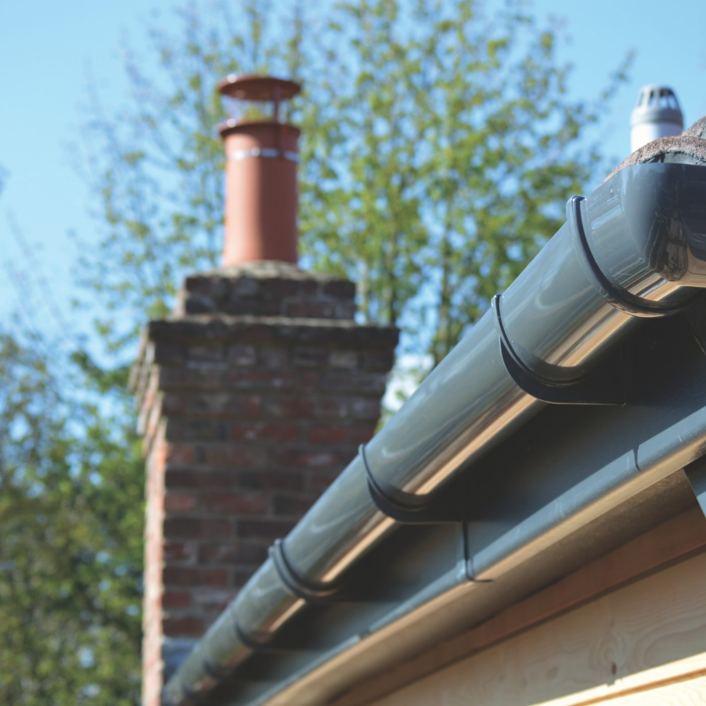 Roofline, showing dark grey guttering