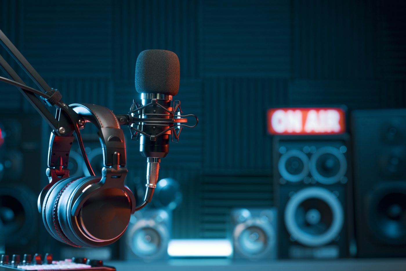 Professional microphone and headphones at the radio station, entertainment and communication concept