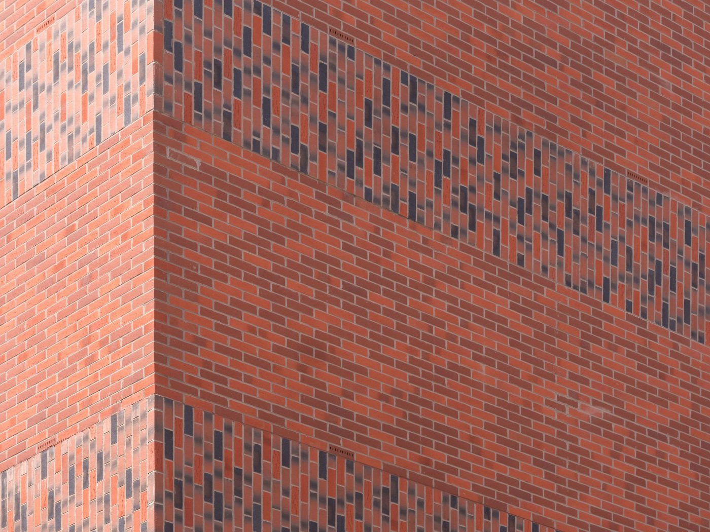 Corium brick tile facade corner of building