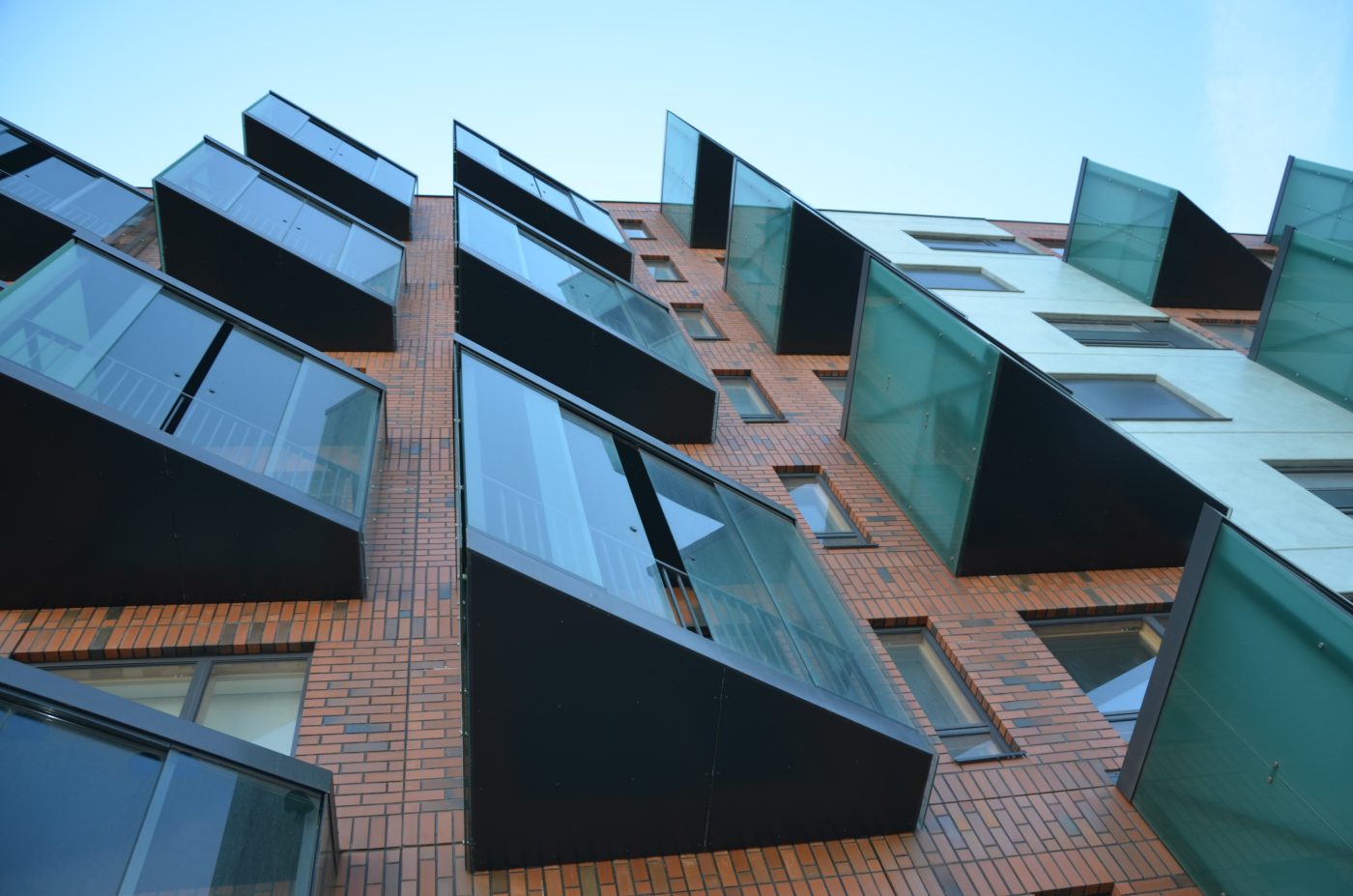Apartment building in Tallinn, Estonia. Used materials: Terca  Red Flame  brick slips from Aseri plant (Estonia).