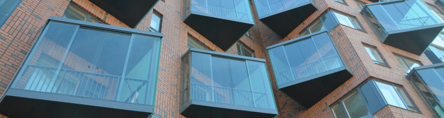 Brick slip facade on exterior of modern apartment building