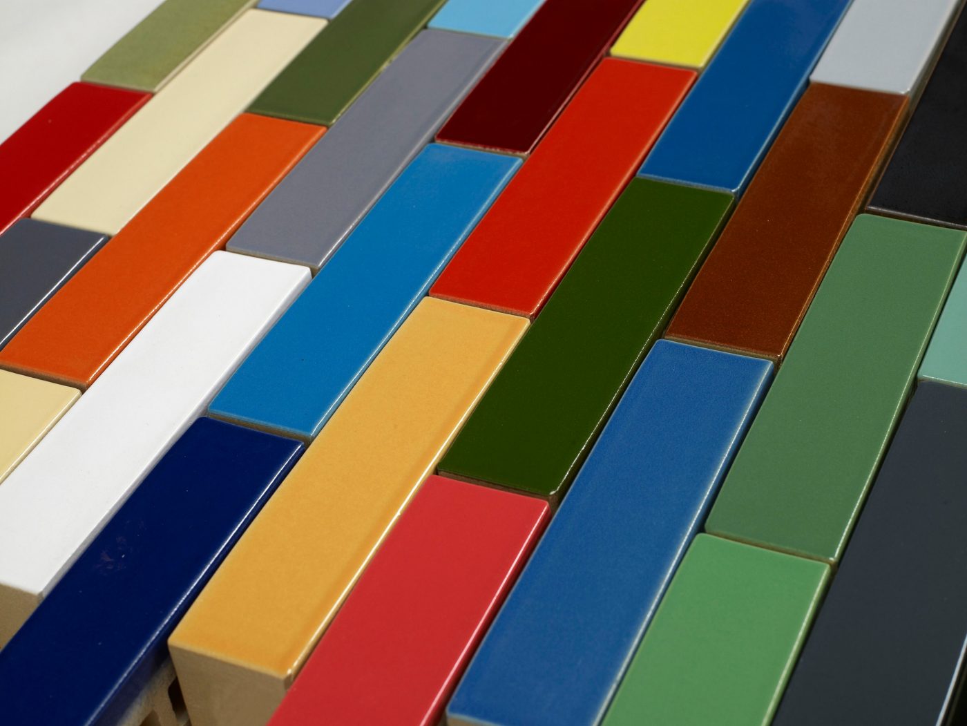 Brick wall with glazed brick pattern in bright colours