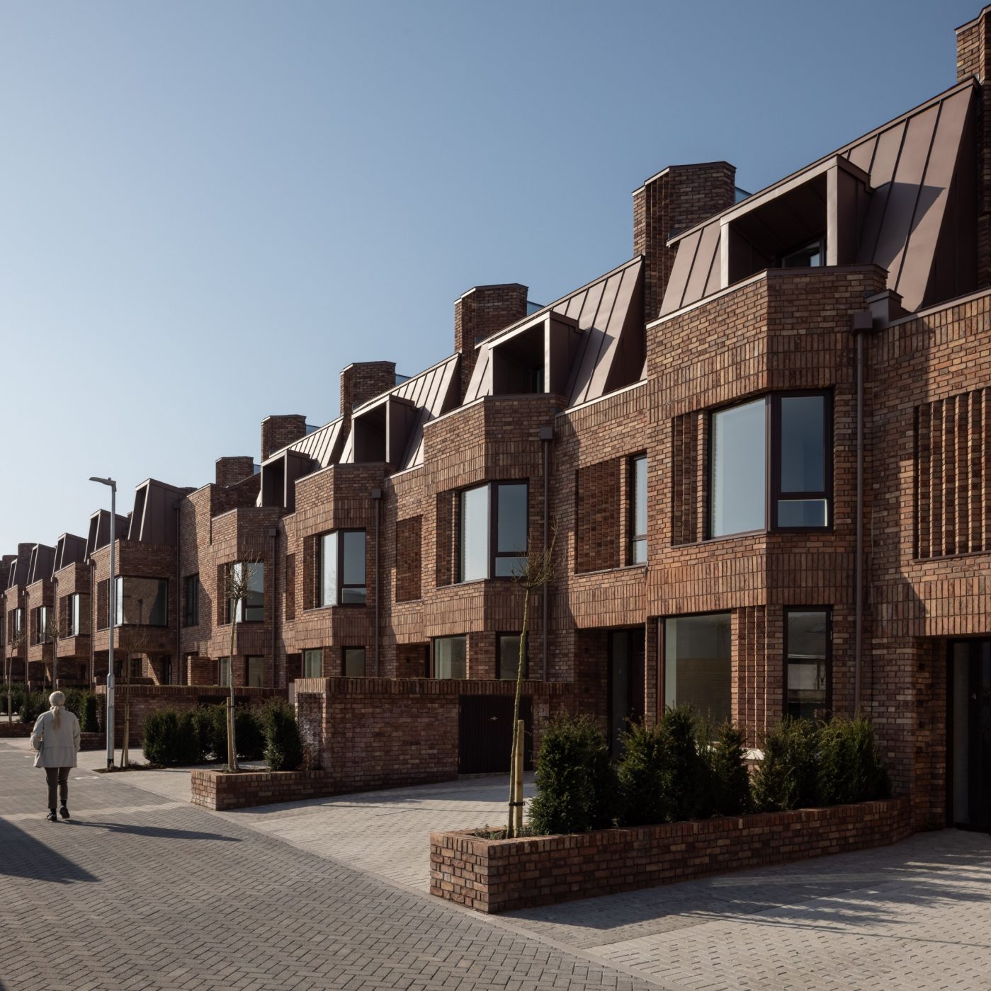Modern terraced houses with Jasmine Blend brick exterior