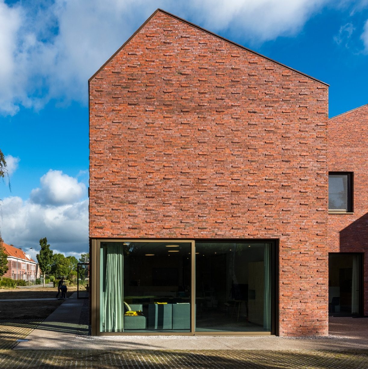 Modern brick house with eco-brick exterior