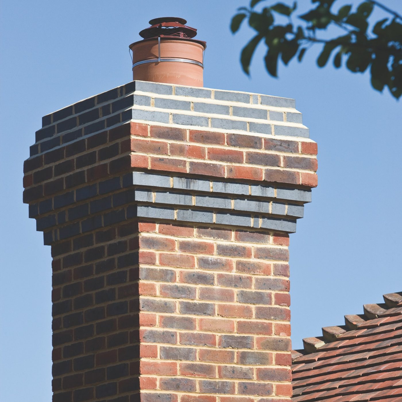 Brickclad chimney on roof