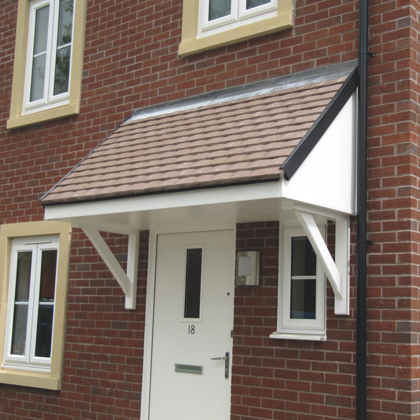 GRP canopy on front of home