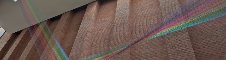 Waterstruck bricks against a red background