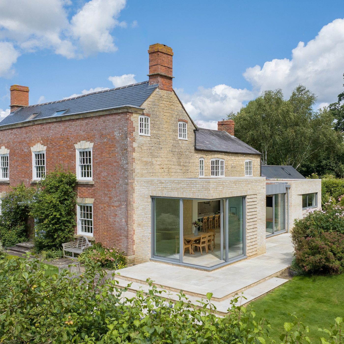Traditional farmhouse with buff Marziale brick extension