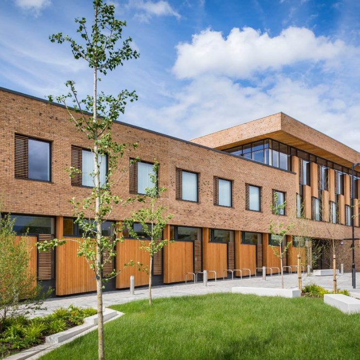 Large traditional house with red facing brick exterior