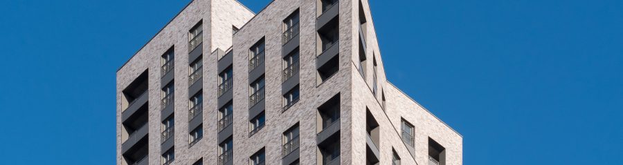 Modern apartment block with facade system cladding