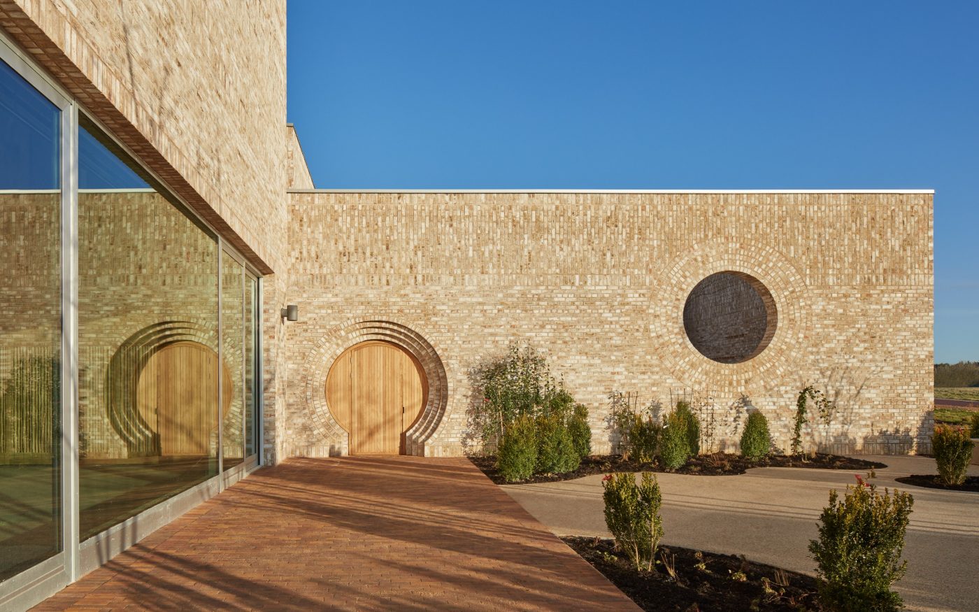 Modern brick community centre in the sunshine