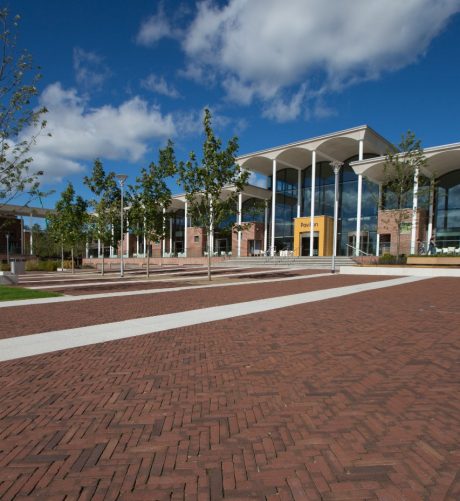 Modern university campus with paved quad landscape