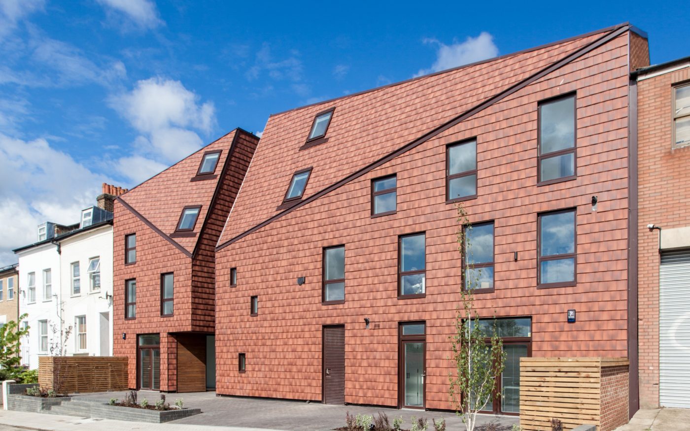 Modern residential building with vertical tiling using 20/20 tiles