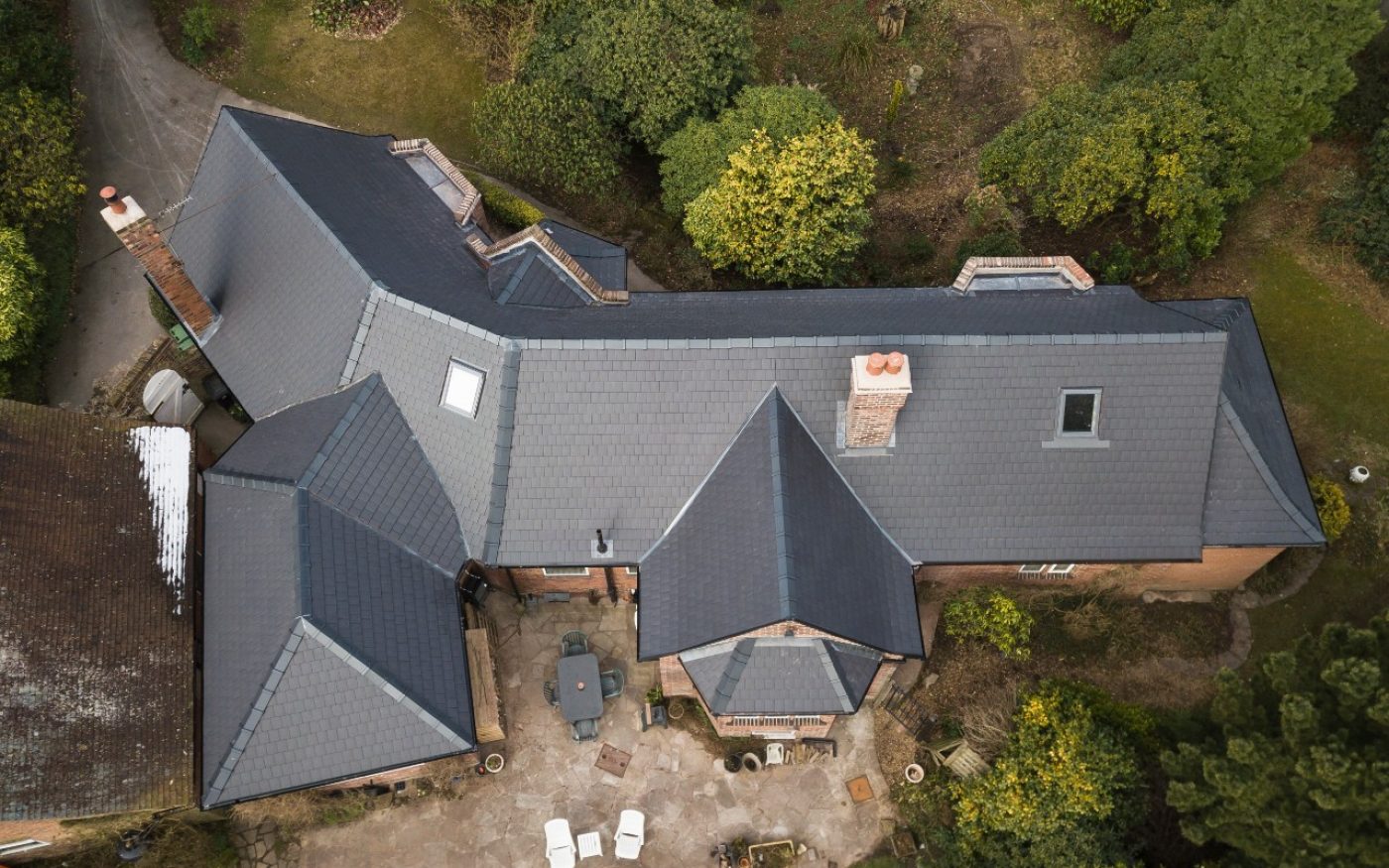 Aerial view of detached house with 20/20 Antique Slate roof