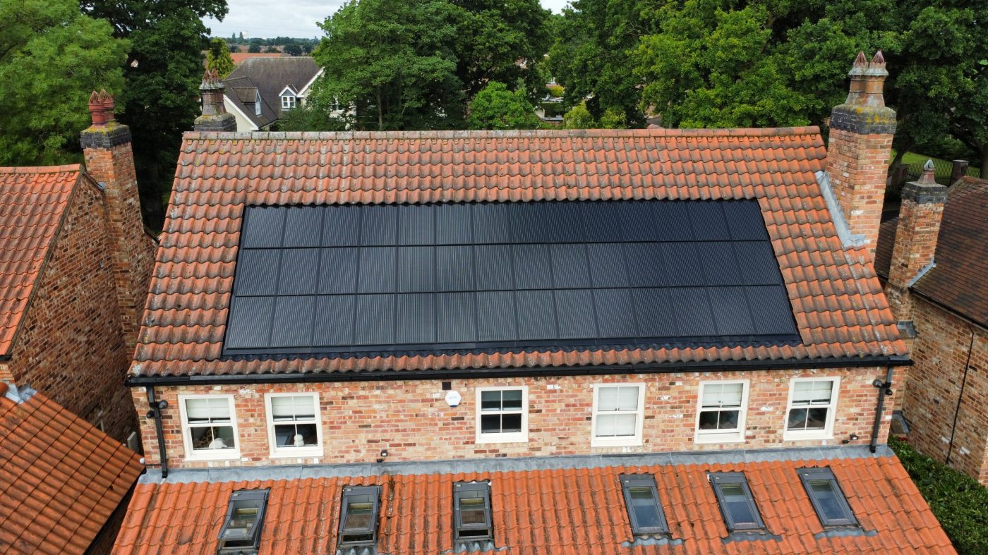 In-roof solar on house with red clay roof tiles