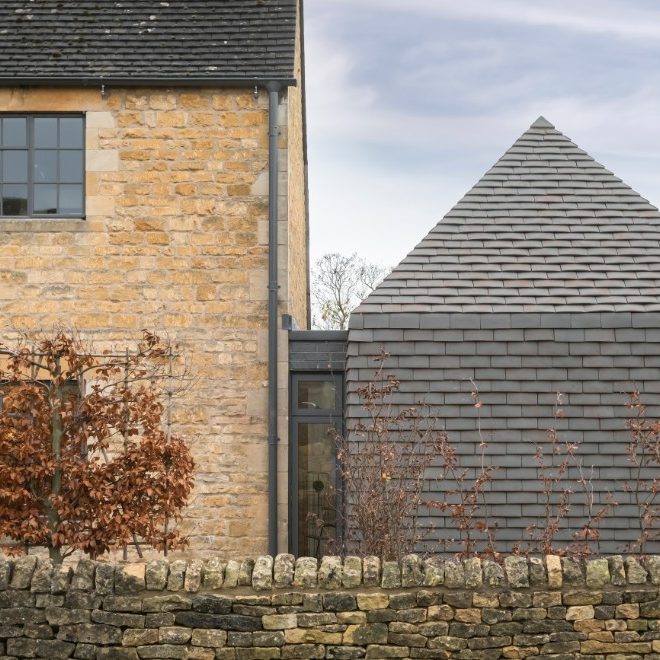 Modern tiled extension on Cotswold cottage