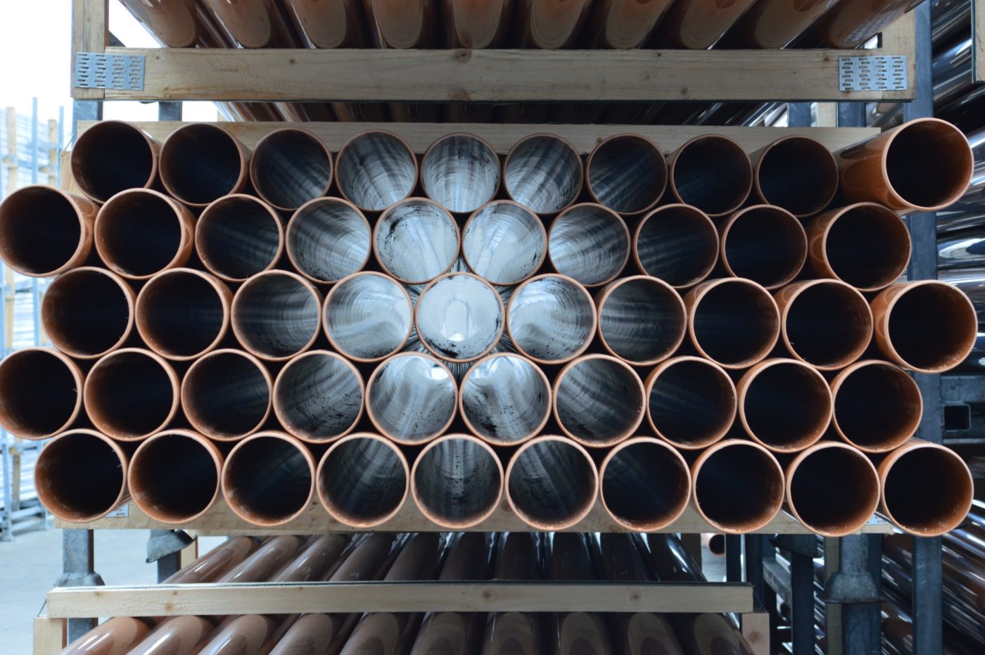 stacked large plastic pipes