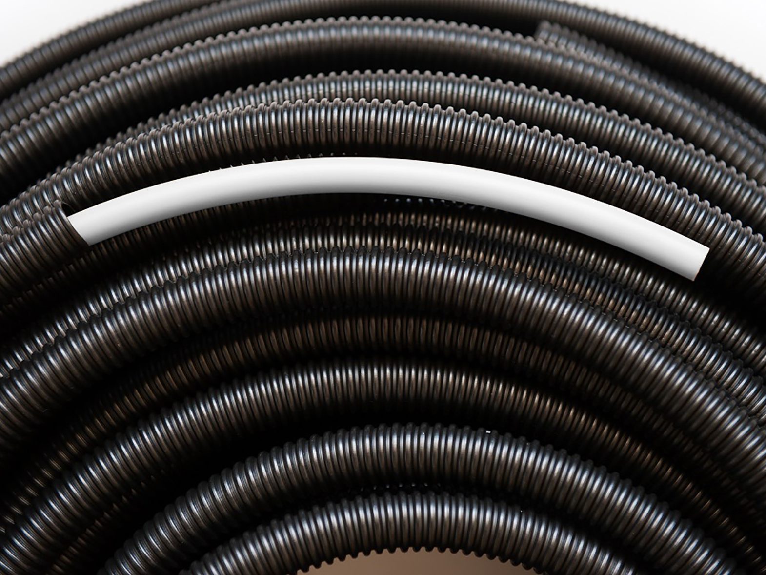Blue pipe products on a mirrored surface