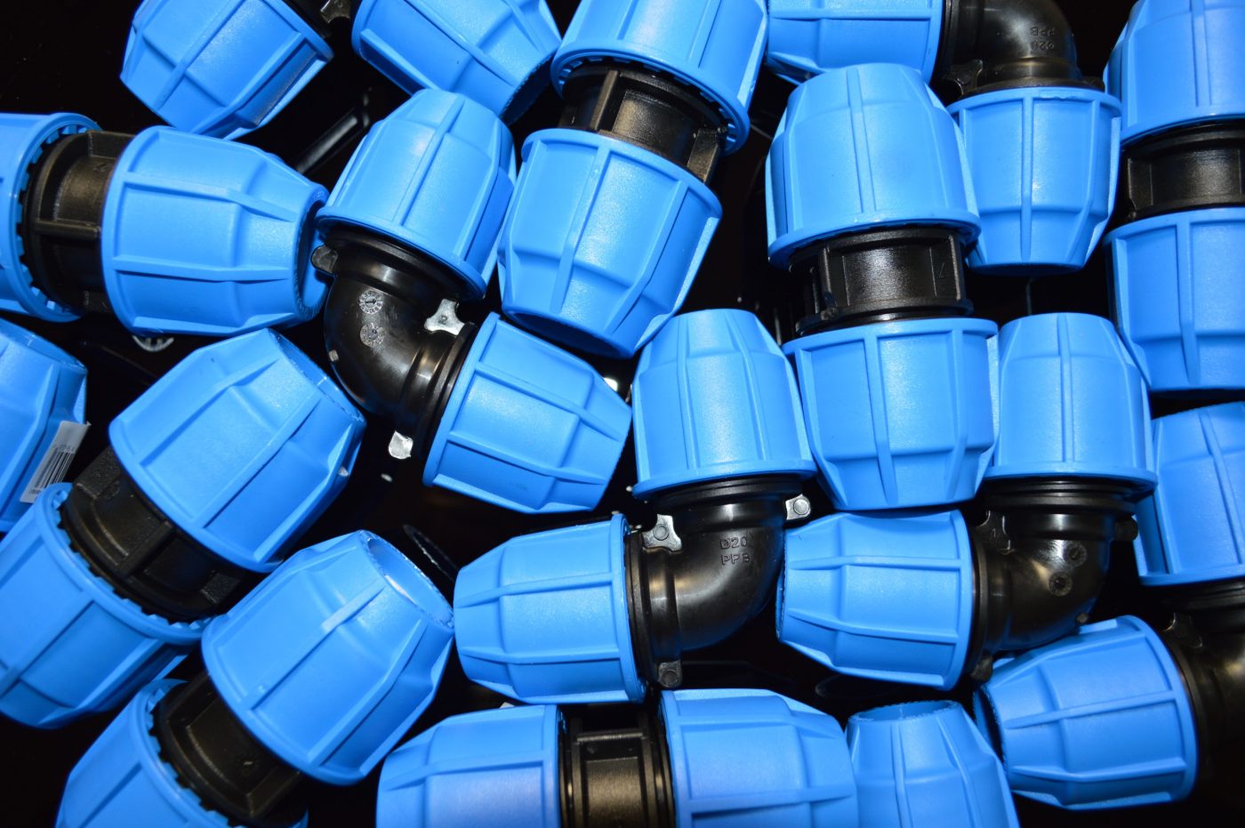 pile of blue and black MDPE products from floplast