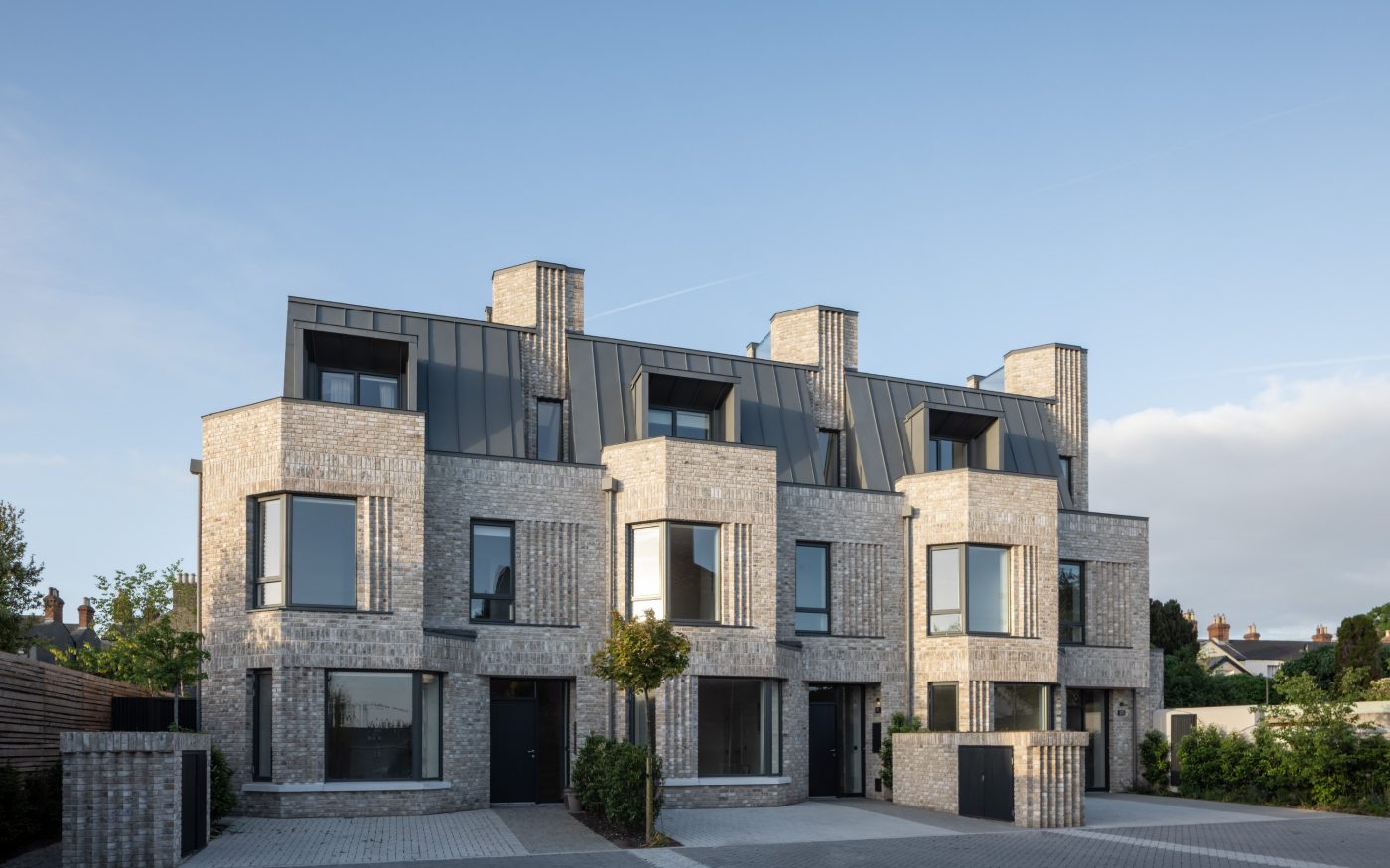 Modern terraced houses with Marziale buff brickwork