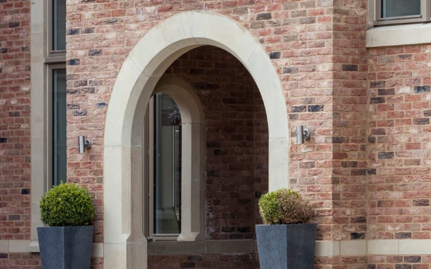 Archway entrance to modern detached house