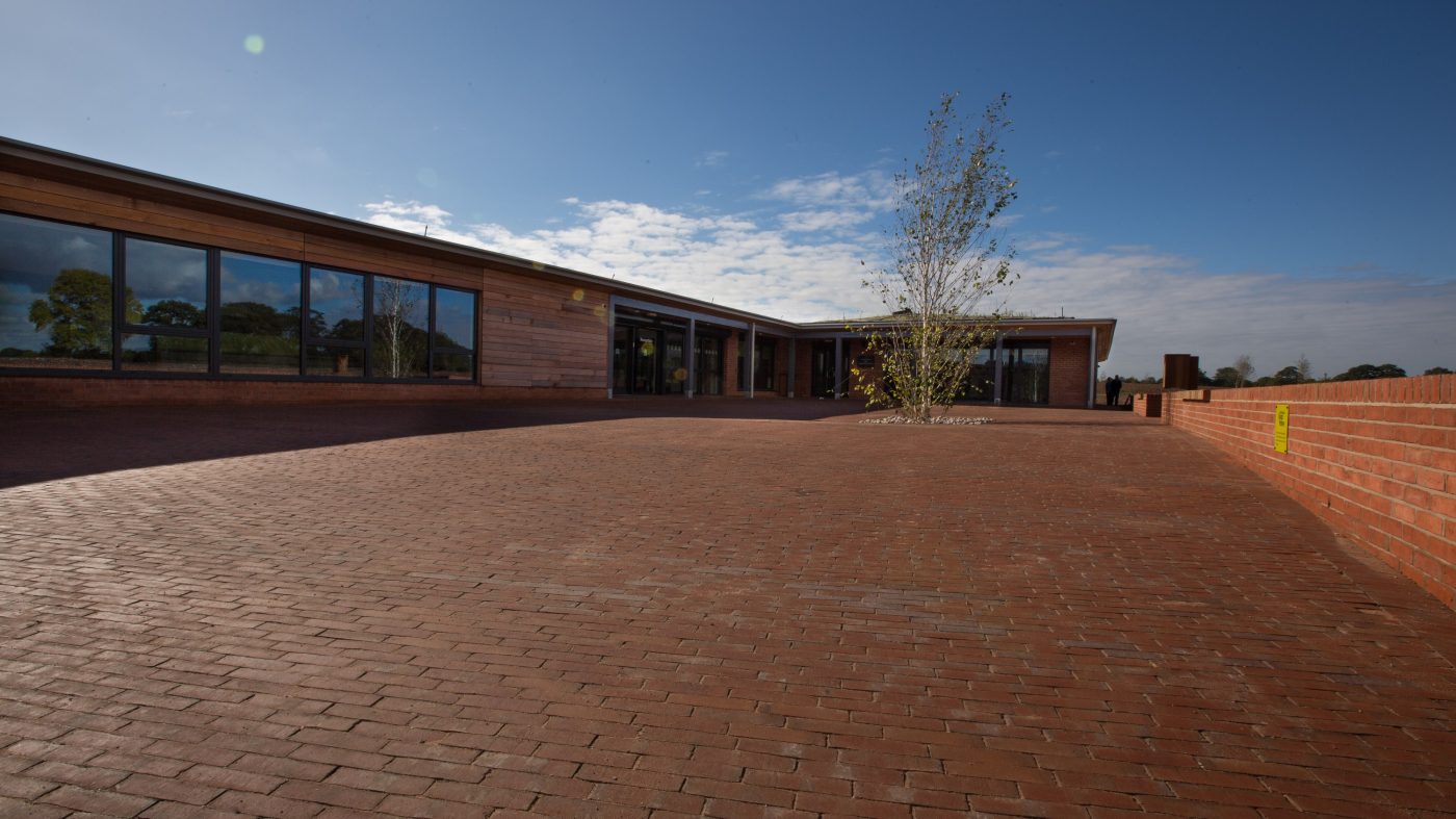 Clay paved outdoor area outside Birmingham Dogs Home
