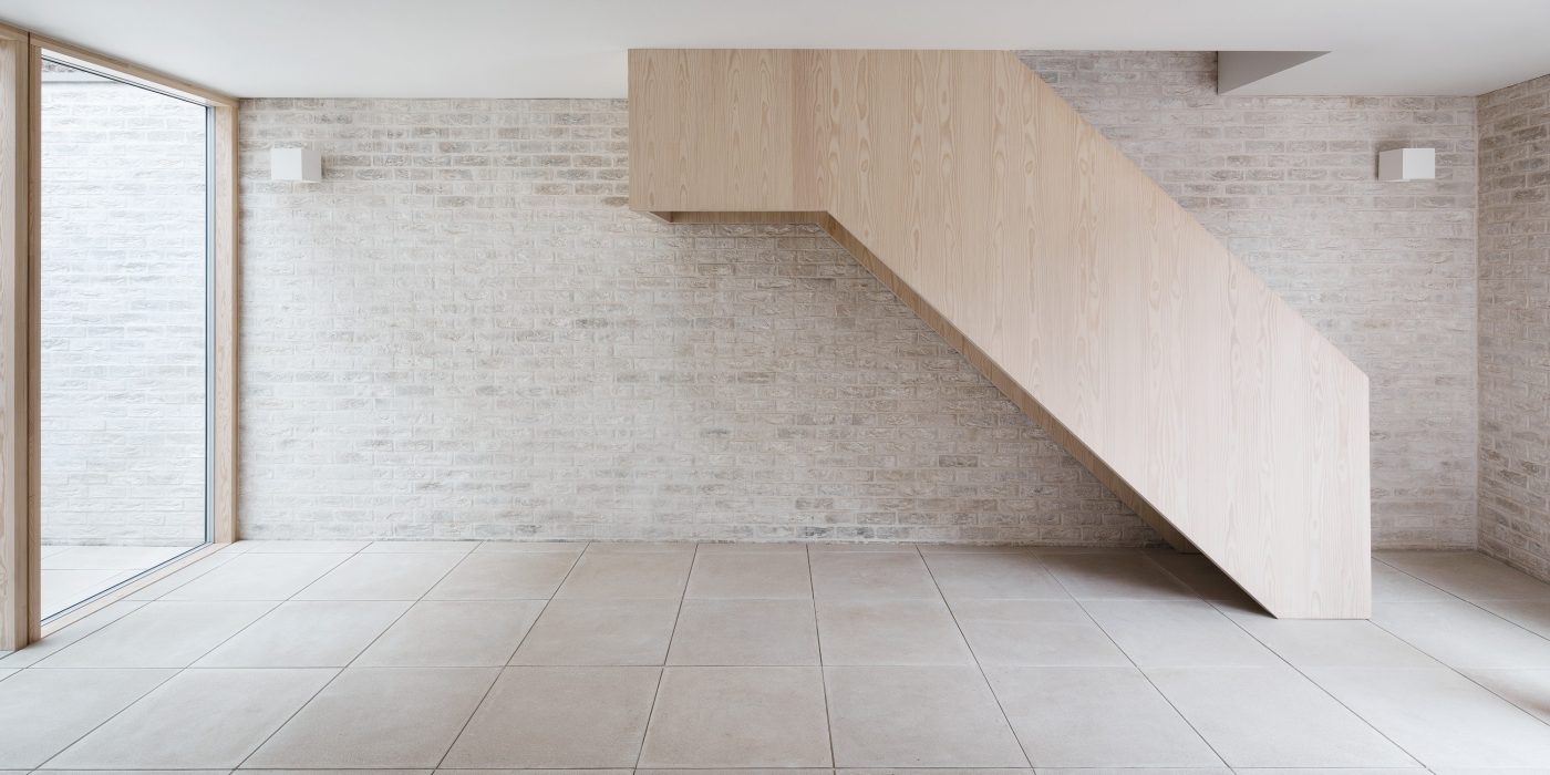 Interior of white brick mews house