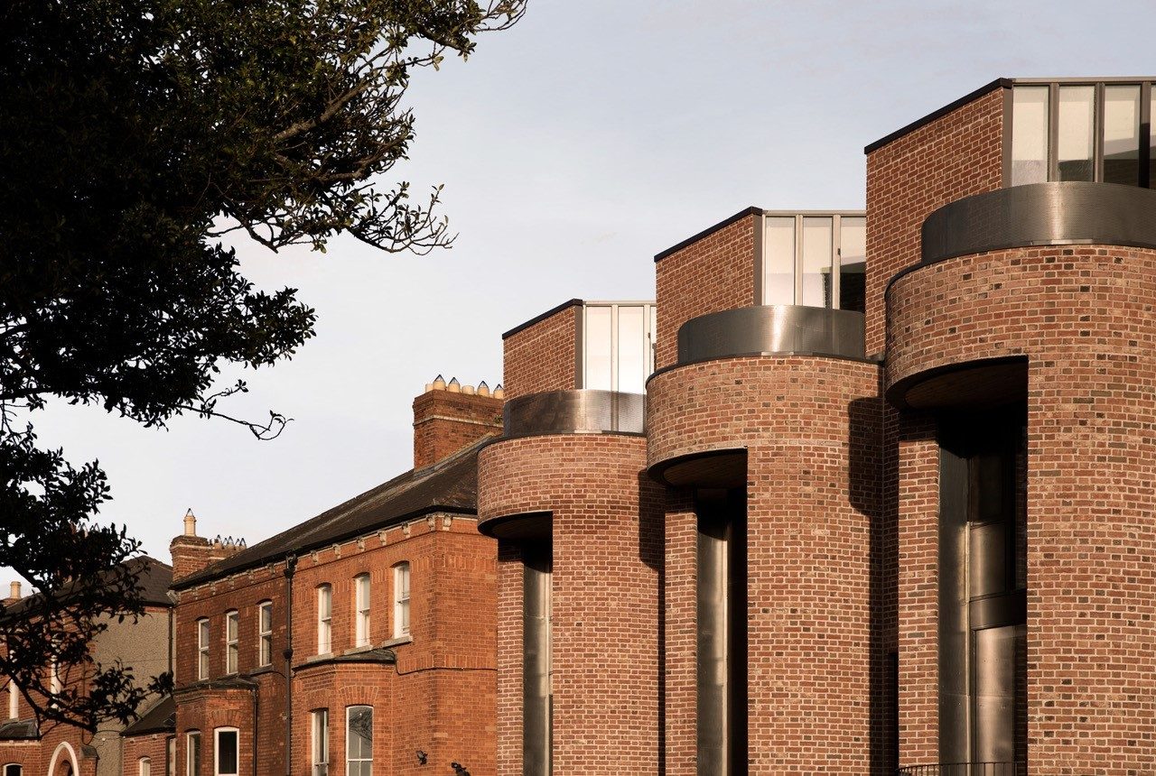 Shot showing big feature window on the second floor of the building