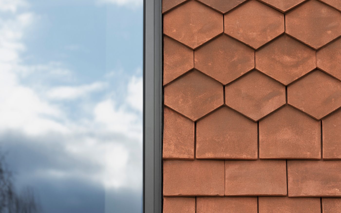 Red Goxhill Tiles cascading down the new extension