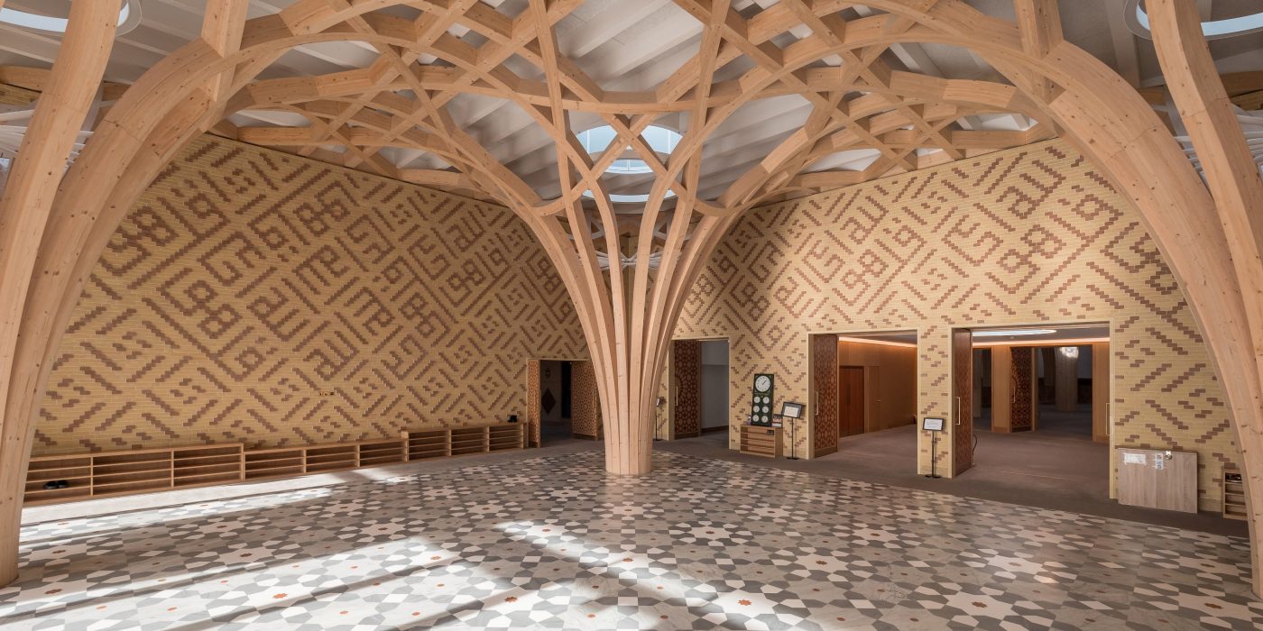 Timber pillars and Corium facade in atrium of mosque