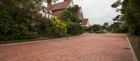 Paved area outside large houses