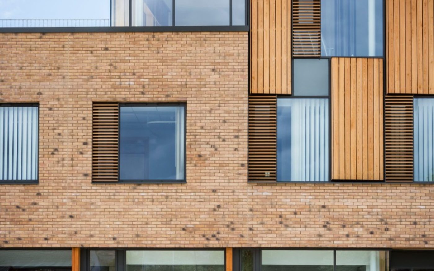 Modern asymmetrical windows in modern building