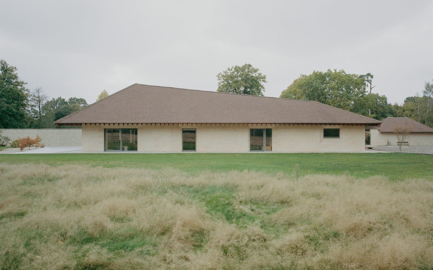 Exterior of the building with distinctive sweeping roof