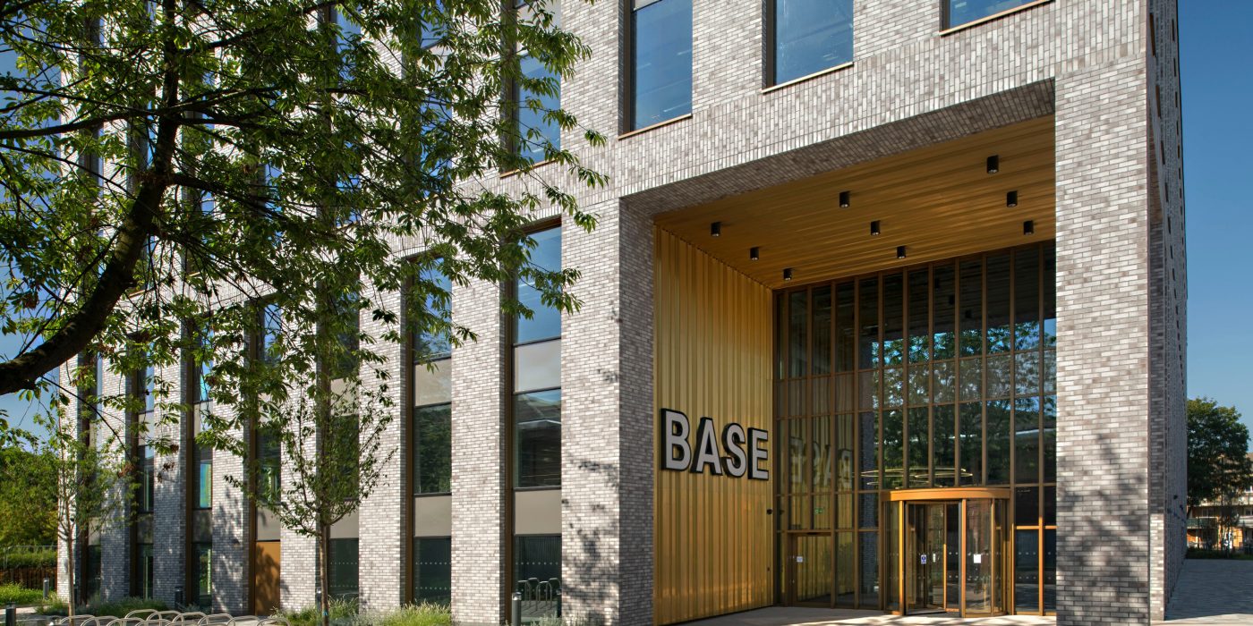 Grand entrance to BASE building with Corium brick tile clad exterior