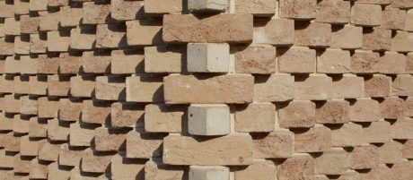 view of the contemporary dog-tooth detailing on the property