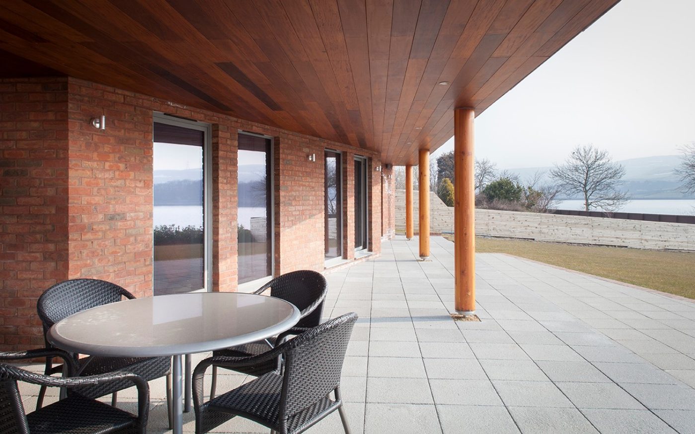 Paved garden space with garden furniture