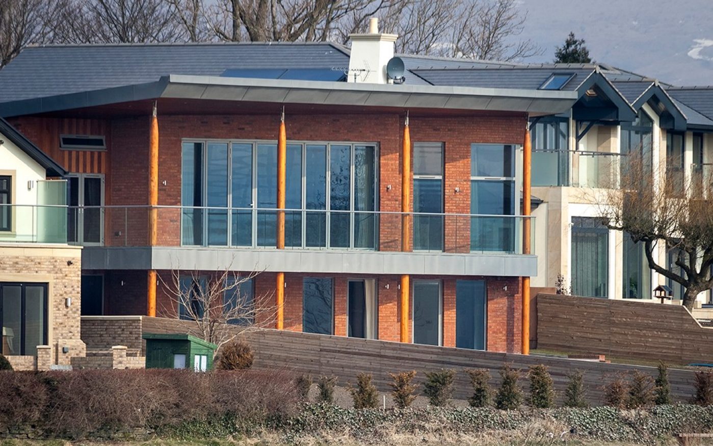 Lakeside home with large windows