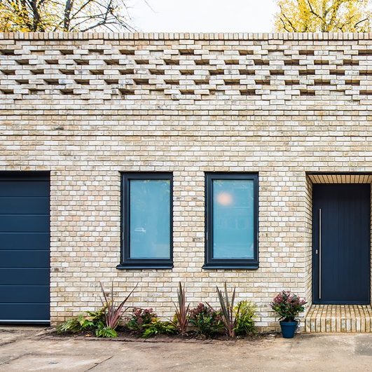 Yellow brick renovated mews house