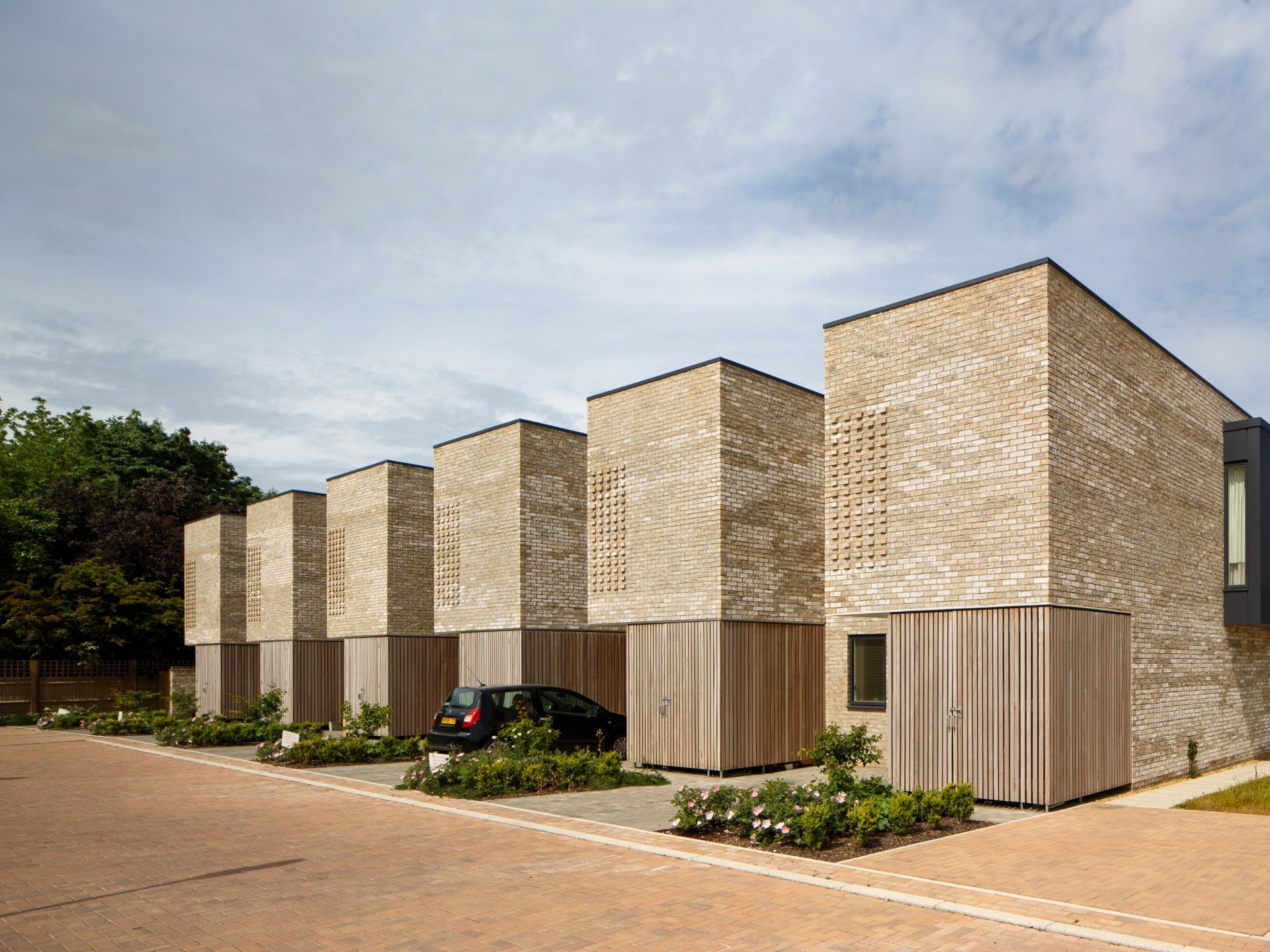 Merging outside and inside in a housing development built in Marziale brick