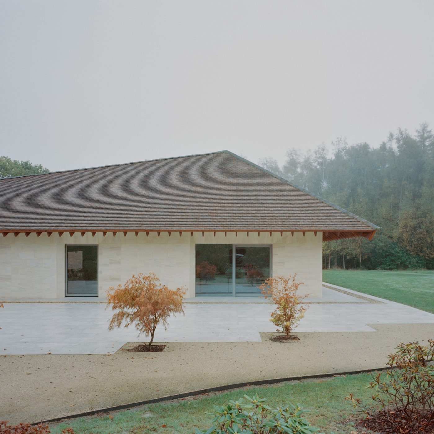 Contemporary new retiring home with brown roof tiling