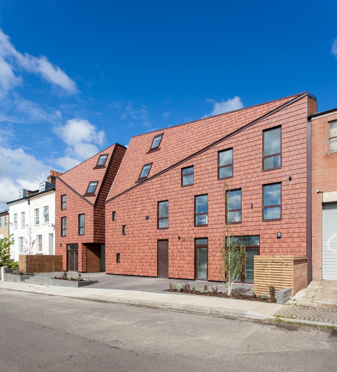A modern residential building with vertical tile cladding in 2020 Flanders tile
