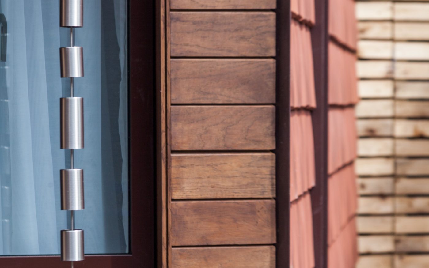 Close-up of tile cladding and modern drainpipe