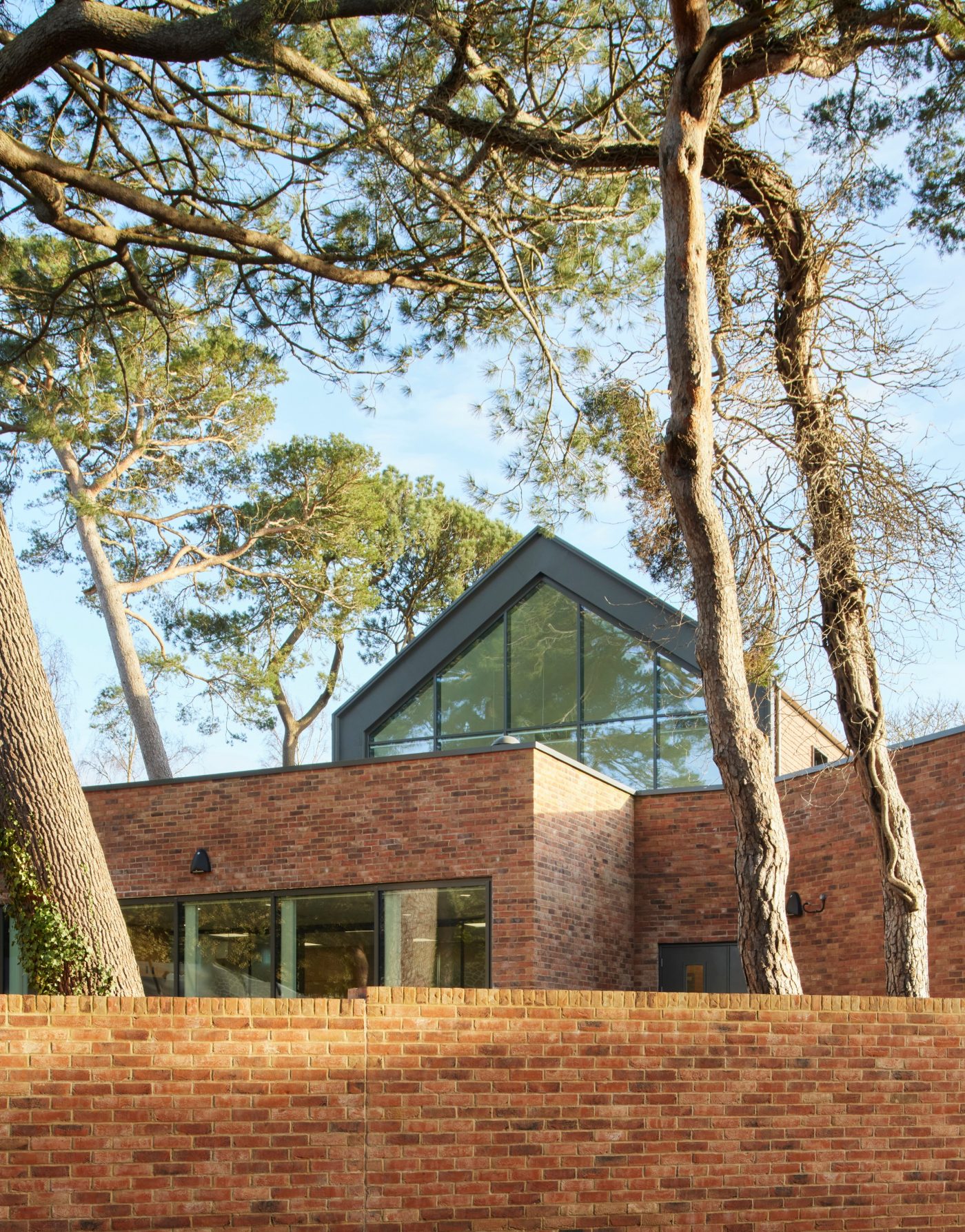 Shot showing big feature window on the second floor of the building