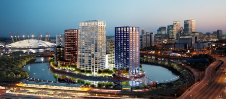 White, red and blue high-rise buildings on river bank in London