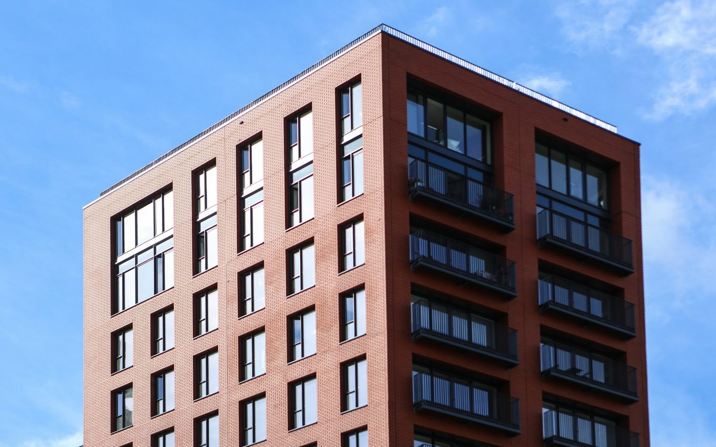 Red glazed brick modern apartment building