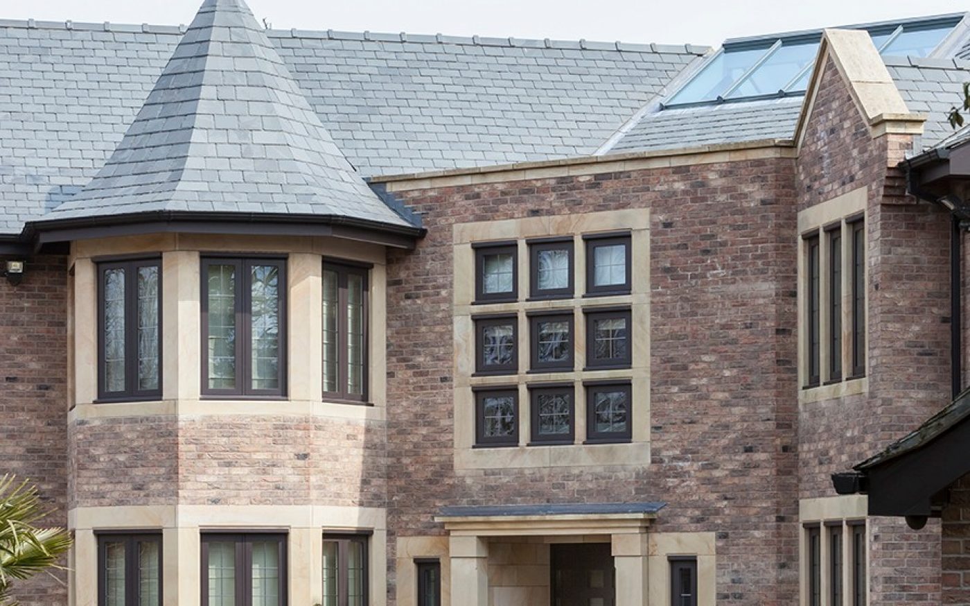 Impressive entrance of modern house with turret